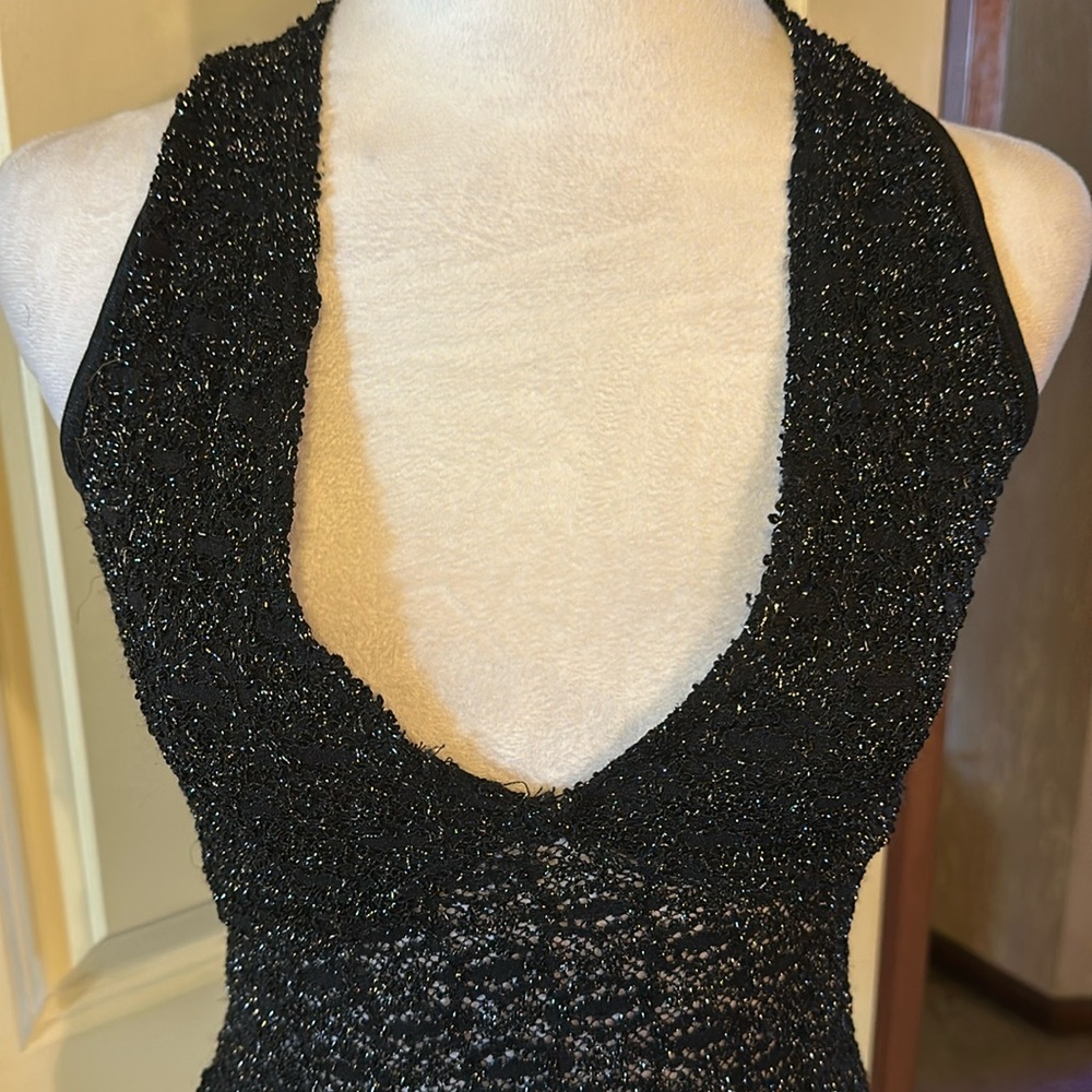 Short sleeve body suit snap at bottom V neck worn once perfect condition